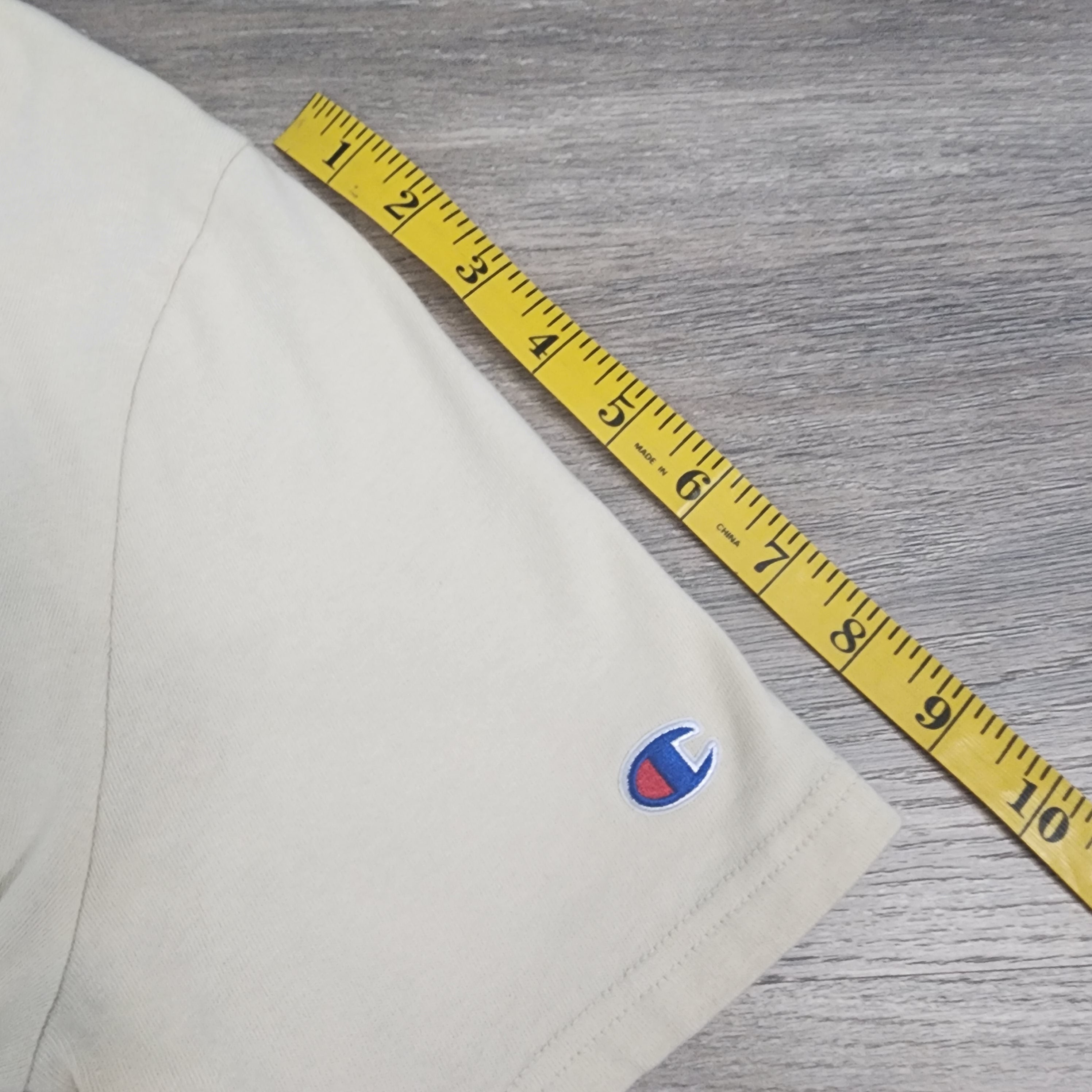 Champion Cream Logo Graphic Tee – Size S