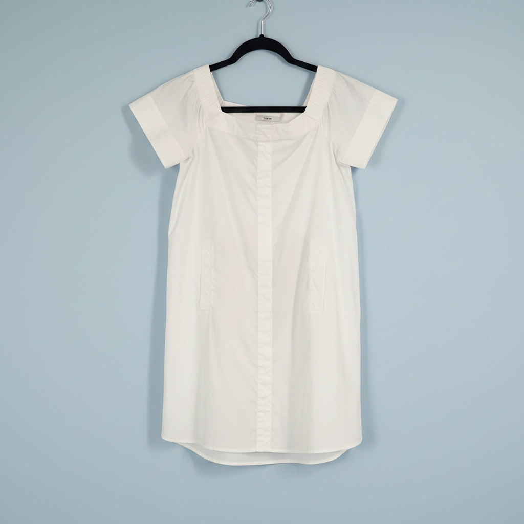 white dress on black hanger