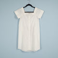 white dress on black hanger