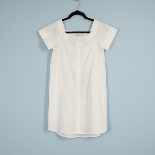 white dress on black hanger