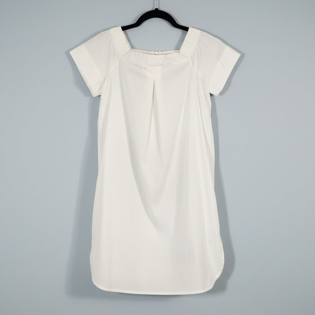 white dress on black hanger
